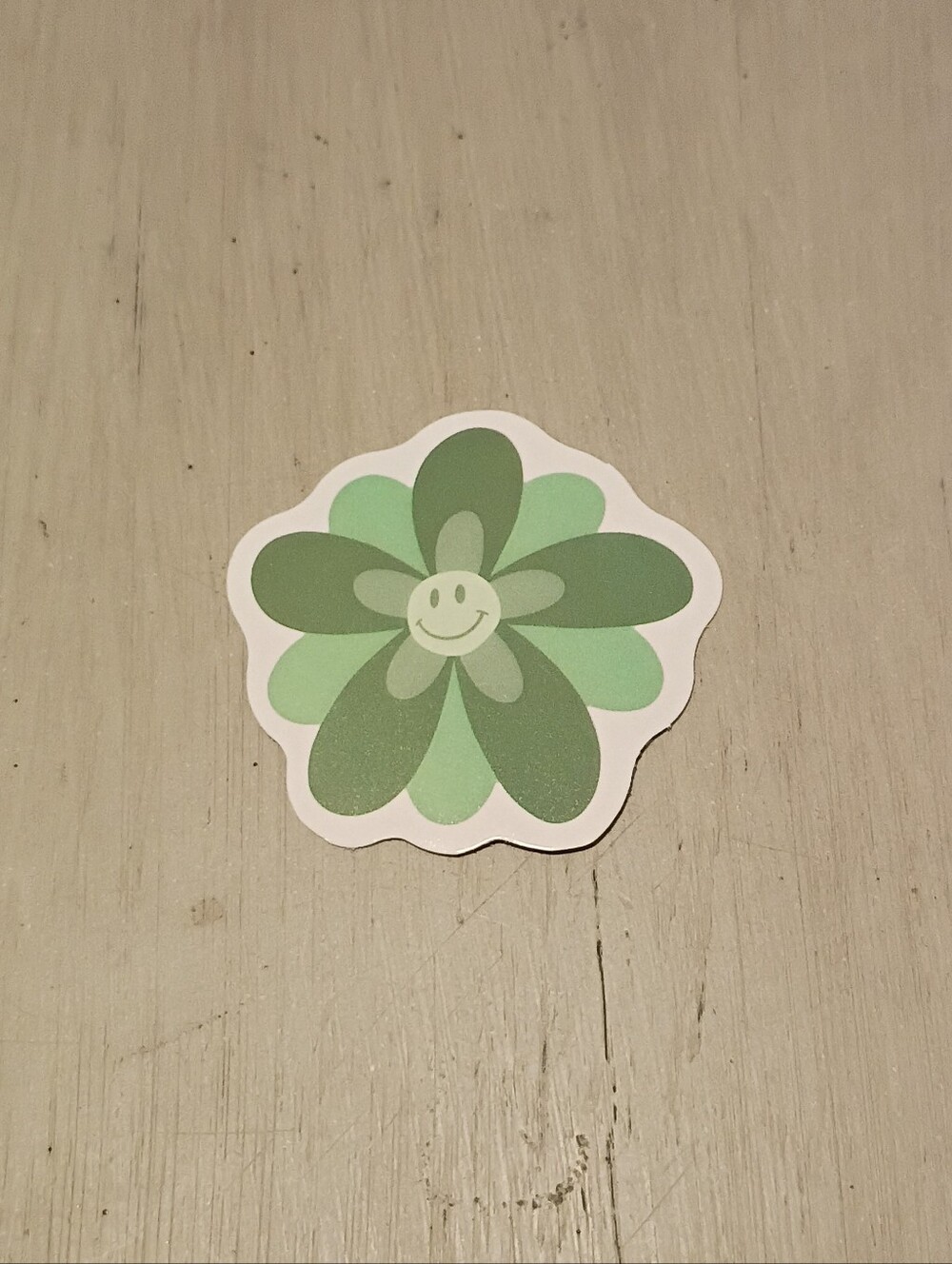 10/$10 Sticker Decal - Green Flowers with Smiley Face Center - Brand New